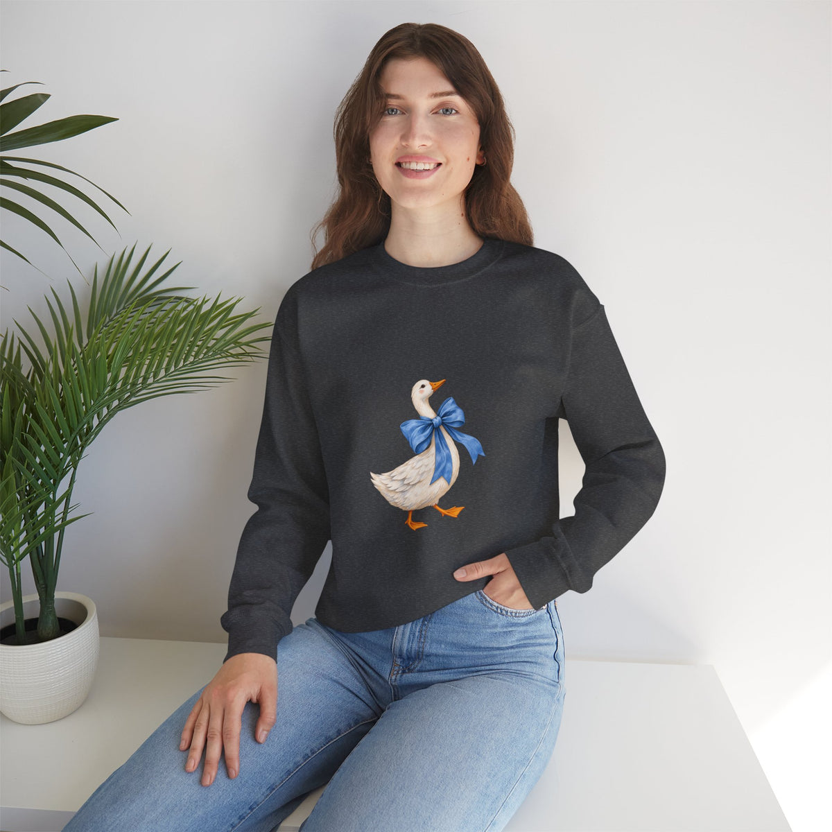 Cute Duck with blue bow Unisex Heavy Blend™ Crewneck Sweatshirt