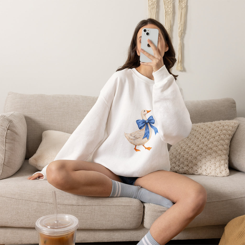 Cute Duck with blue bow Unisex Heavy Blend™ Crewneck Sweatshirt