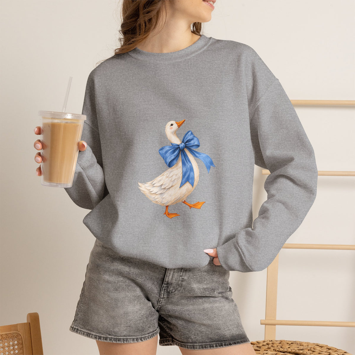 Cute Duck with blue bow Unisex Heavy Blend™ Crewneck Sweatshirt