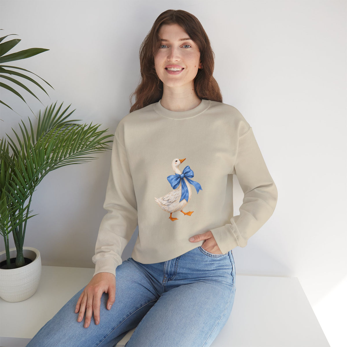 Cute Duck with blue bow Unisex Heavy Blend™ Crewneck Sweatshirt